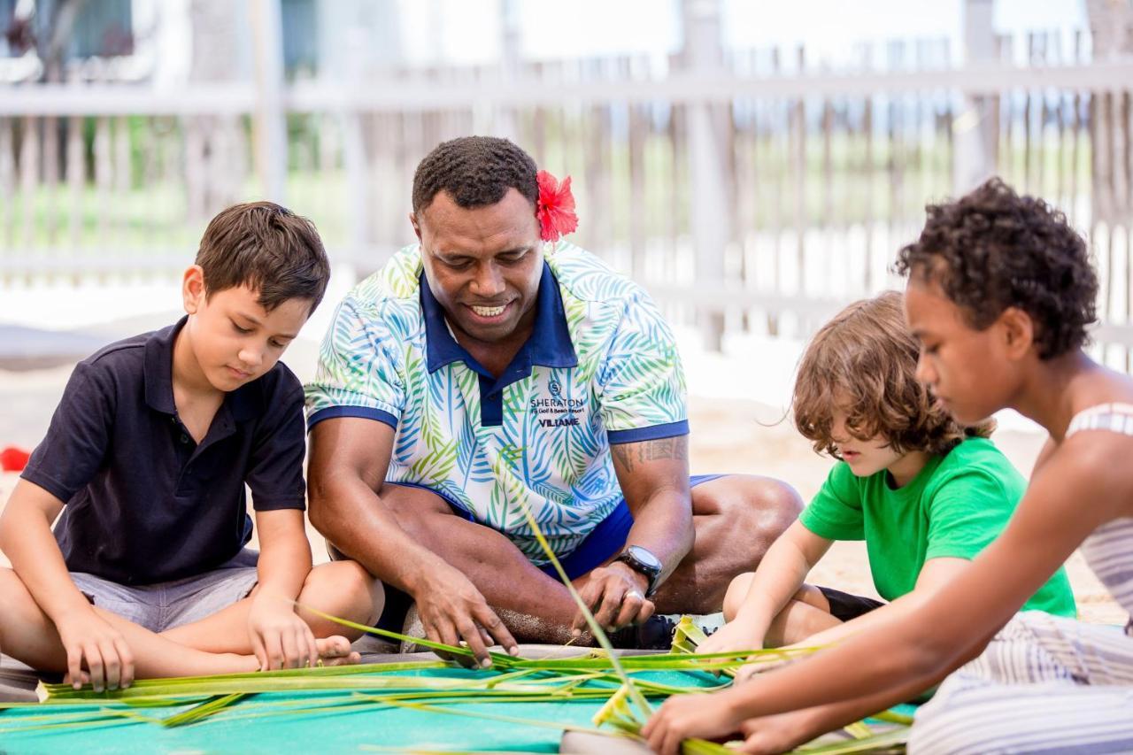 Sheraton Fiji Golf & Beach Resort Denarau Island Bagian luar foto A father and his children